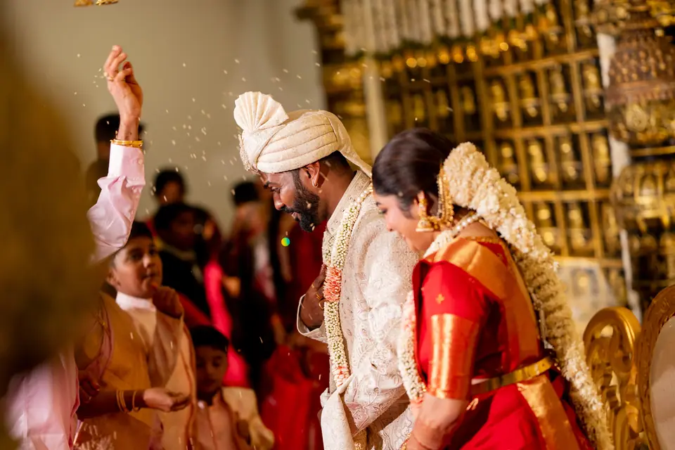 Rice thrown in the air above the couple during the ceremony